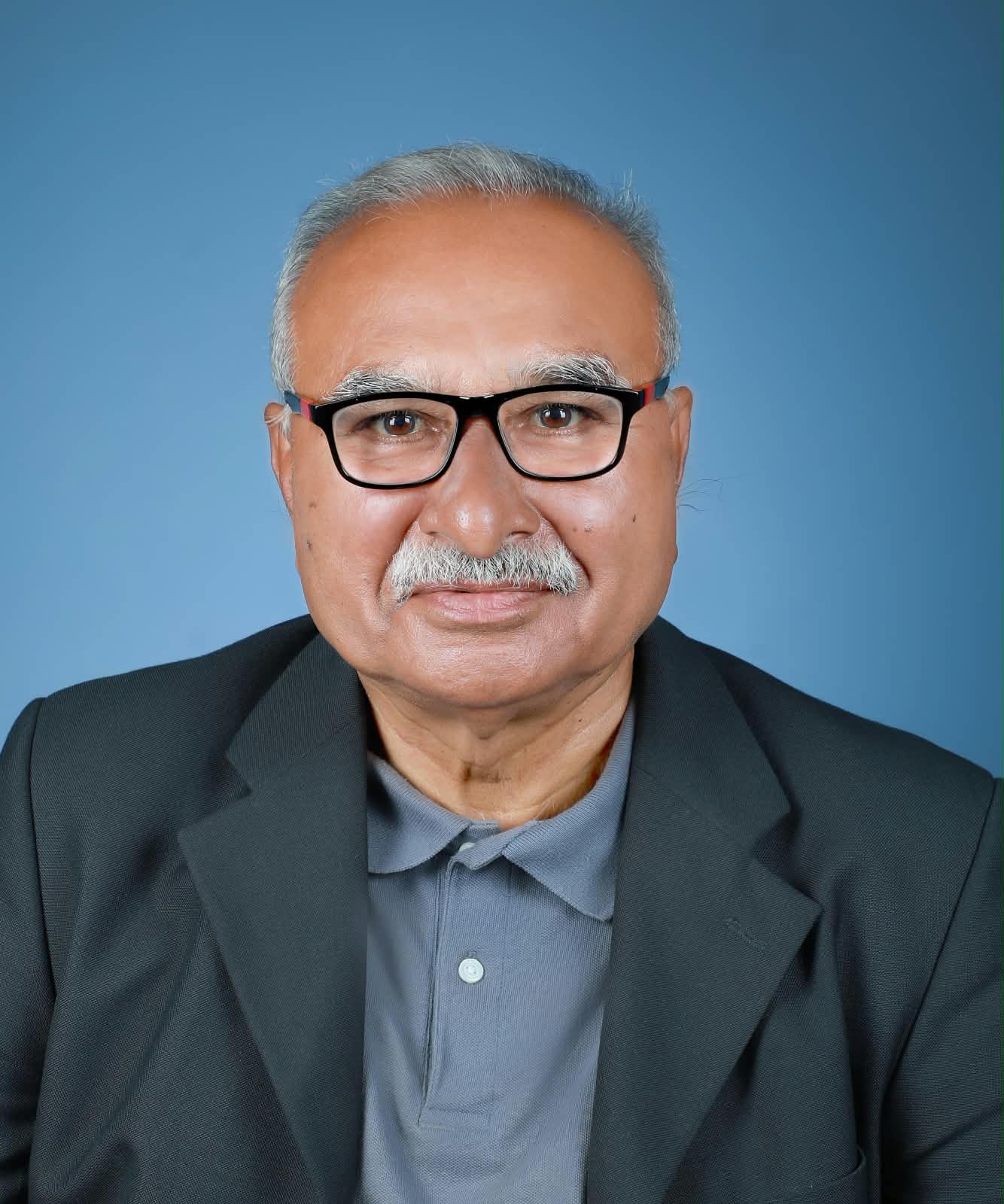 Dr. Satish Patil — Director